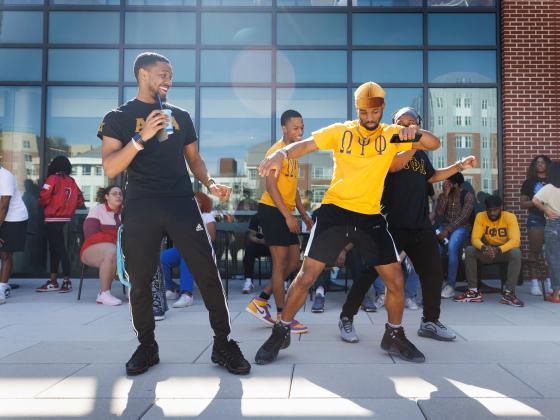 Students from NPHC fraternities stepping